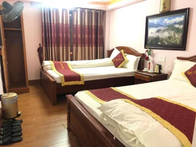Chambre double ou lits jumeaux Deluxe avec balcon — Quoc Thai Sapa Hotel